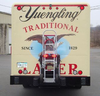 An example of an asset improvement can be the addition of a logo to a delivery truck.