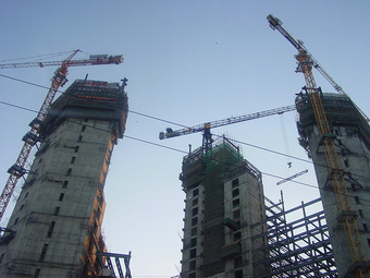 The construction of a building requires the use of capital.