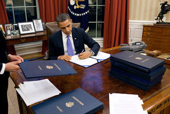 President Barack Obama Signing Legislation