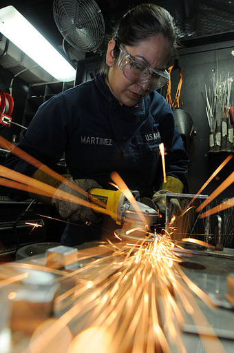 A Navy technician welding