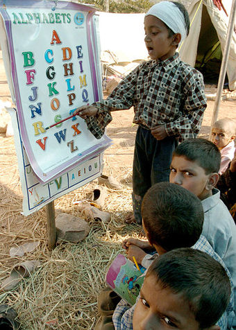 Displaced Pakistani children learn English as a second language