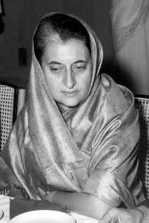  Indira Gandhi,  the daughter of India's first Prime Minister, Jawaharlal Nehru,  served as prime minister for three consecutive terms (1966–77) and a fourth term (1980–84).  