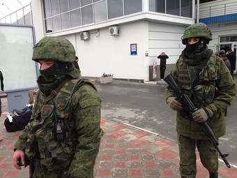 Unidentified gunmen on patrol at Simferopol International Airport