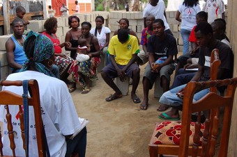 An HIV/AIDS educational outreach session in Angola, photo by USAID Africa Bureau.