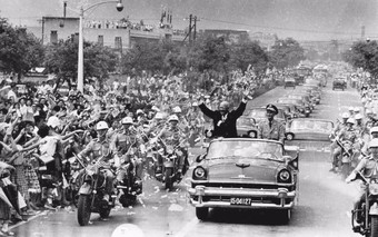  President Chiang Kai-shek and President Dwight D. Eisenhower waved to crowds during Eisenhower's visit to Taipei in June 1960, author unknown.  